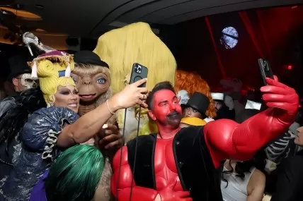 Heidi Klum Makes a Grand Entrance at the Annual Halloween Party Dressed in an Intricate E.T. Costume
